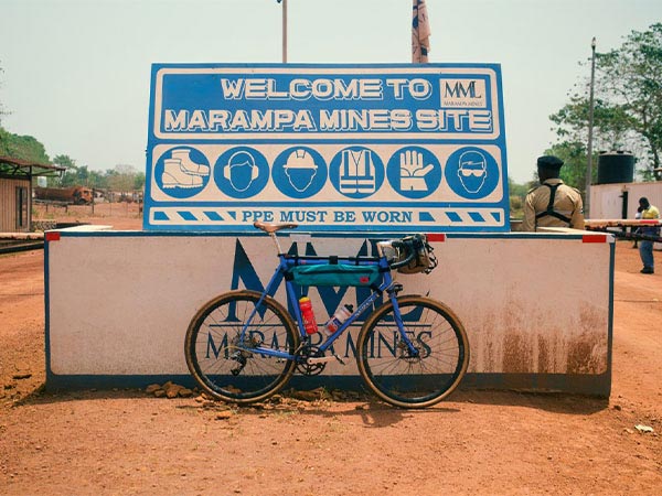 Midnight Special parked outside in front of Welcome to Marampa Mine Site sign