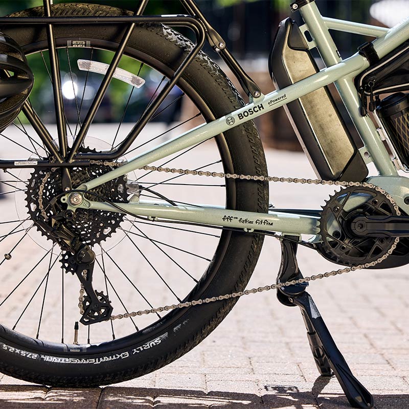 Surly Skid Loader close up of cranks, battery, rear wheel