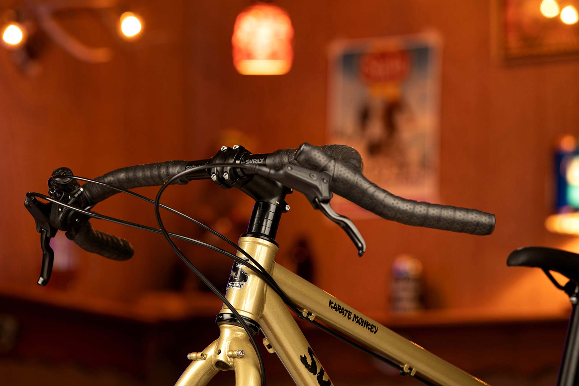 Surly Corner Bar wrapped with black bar tape on complete Surly Karate Monkey with mountain brake levers and shifter