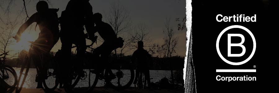 Certified B Corporation, bikers derbying near lakeshore with sun setting