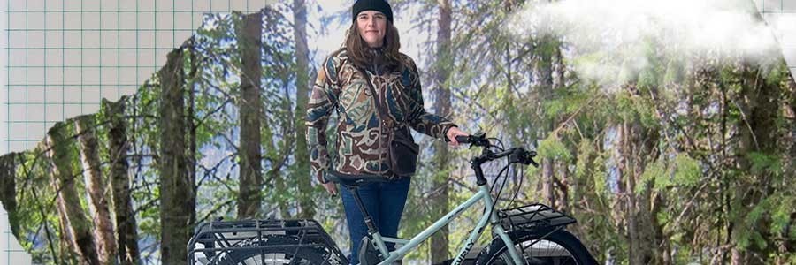 Athena standing with Surly Skid Loader Cargo Ebike