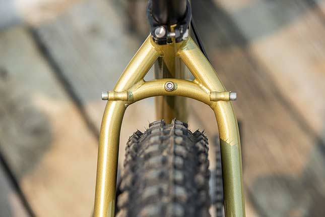 Rear tire clearance on gold Karate Monkey mountain bike with Dirt Wizard tire